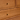 Close-up of Cariboo Marlow Dresser brass knob and ash grain