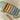 Toddler tapping notes on the Little Dutch wooden xylophone