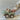 Close look at the small wooden ranger figure that comes with the safari car