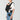 Parent carrying a newborn in the front inward position in the CYBEX Laya carrier
