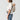 Toddler in the back inward carry position in the CYBEX Amya baby carrier