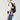 Toddler in the back inward carry position in the CYBEX Laya baby carrier