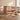 Boori Noosa Cot Bed next to rug and toys