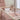 WTTW Wildflower cot quilt — close-up of floral embroidery on 100% cotton fabric